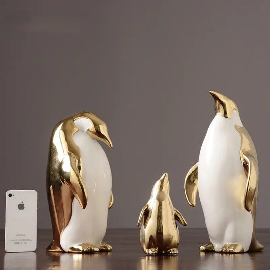 Figuras Decorativas de Pingüinos en Cerámica (Acabado en Oro)